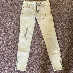 Distressed light grey white denim